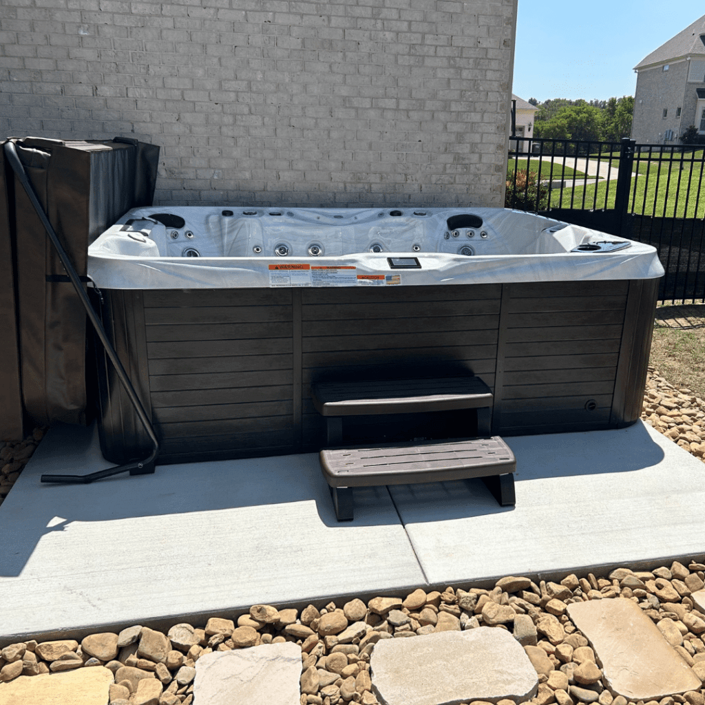 Finished swim spa concrete pad with smooth surface by Hot Tub Pads